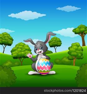 Cartoon bunny waving hand with holding easter eggs in the park