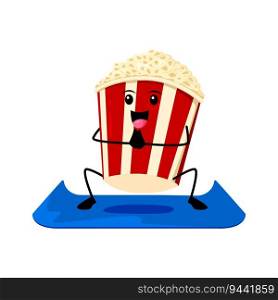 Cartoon fast food popcorn character on yoga fitness sport. Street cafe meal comical mascot, junk food or cinema snack, takeaway cafe popcorn bucket isolated vector childish personage squatting on mat. Cartoon fast food popcorn funny character on yoga