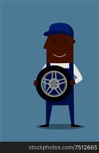 Cartoon friendly smiling african american mechanic in blue uniform standing with wheel, for profession concept design. Car mechanic in blue uniform with wheel