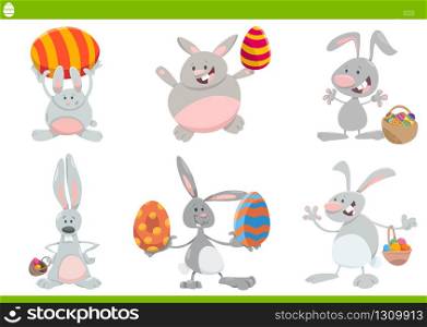 Cartoon Illustration of Funny Easter Bunnies on Easter Holiday Time with Colored Eggs Set