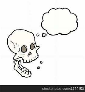 cartoon laughing skull with thought bubble
