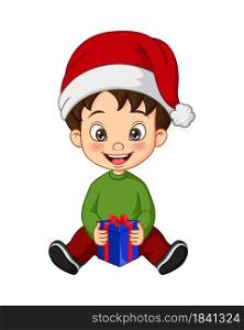 Cartoon little boy wearing christmas costume holding a gift
