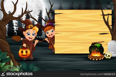 Cartoon of couple witch standing beside wooden board