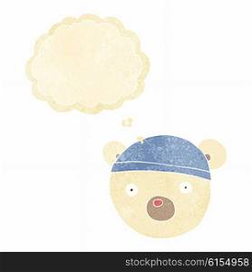 cartoon polar bear cub wearing hat with thought bubble