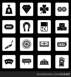 Casino icons set in white squares on black background simple style vector illustration. Casino icons set squares vector