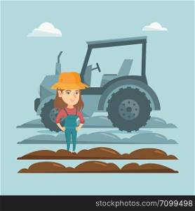 Caucasain happy farmer in summer hat standing on the background of tractor preparing land. Young smiling farmer standing in a field in front of tractor. Vector cartoon illustration. Square layout.. Farmer standing on the background of tractor.
