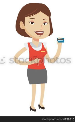 Caucasian female cashier holding credit card. Happy female cashier at work. Smiling cashier pointing with her finger at credit card. Vector flat design illustration isolated on white background.. Cashier holding credit card at the checkout.