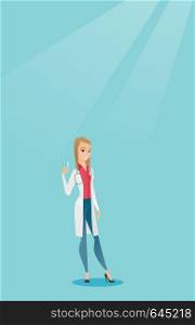 Caucasian female doctor holding a medical injection syringe. Young female doctor standing with a syringe. Doctor holding a syringe ready for injection. Vector flat design illustration. Vertical layout. Doctor holding syringe vector illustration.