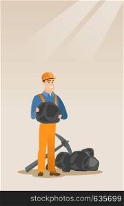 Caucasian male miner in hard hat holding coal in hands. Young miner with a pickaxe. Miner working at coal mine. Young happy male miner at work. Vector flat design illustration. Vertical layout.. Miner holding coal in hands vector illustration.