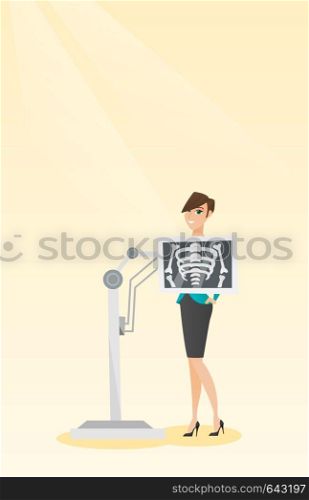 Caucasian woman during chest x ray procedure. Smiling woman with a x ray screen showing skeleton. Happy female patient visiting a roentgenologist. Vector flat design illustration. Vertical layout.. Patient during x ray procedure vector illustration