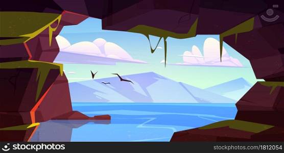 Cave in rock with moss and water and view to lake and mountains on horizon. Vector cartoon landscape of stone cavern entrance, sea, flying birds and clouds in sky. Cave in rock with view to lake and mountains