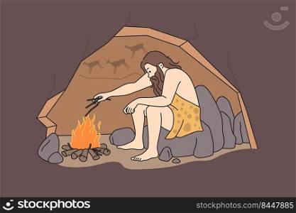 Caveman sitting in cave near bonfire warming. Male prehistoric person making fire during ancient ages. Vector illustration.. Caveman making fire in cave