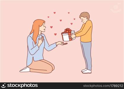 Celebrating Happy Mothers day concept. Small smiling boy cartoon character standing giving present box to his young mother for holiday vector illustration . Celebrating Happy Mothers day concept.