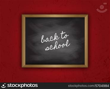 Chalkboard with the words back to school on a grunge red background