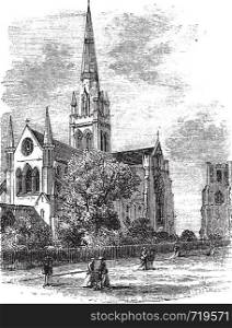 Chichester Cathedral or Cathedral Church of the Holy Trinity, in Sussex, England, during the 1890s, vintage engraving. Old engraved illustration of Chichester Cathedral.