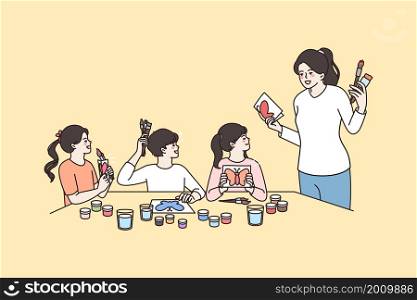 Children hobbies and drawing concept. Young mother or teacher standing and explaining sitting group of kids how to paint vector illustration . Children hobbies and drawing concept