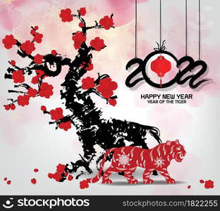 Chinese new year 2022 year of the tiger red and gold flower and asian elements paper cut with craft style on background.( translation : chinese new year 2022, year of tiger )