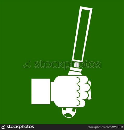 Chisel tool in man hend icon white isolated on green background. Vector illustration. Chisel tool in man hend icon green