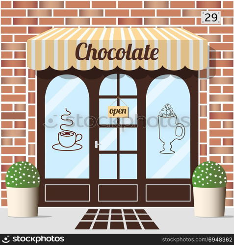 Chocolate shop facade.. Chocolate shop building. Facade of brick. Chocolate sign sticker on window. Vector illustration EPS10