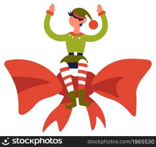 Christmas and new year celebration and greetings, isolated personage in traditional costume sitting on ribbon bow. Elf or dwarf in hat and striped socks, santa helper assistant. Vector in flat style. Elf boy character sitting on big ribbon bow vector
