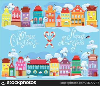 Christmas and New Year holidays card with small fairy town on light blue background with decorative colorful houses in winter time.
