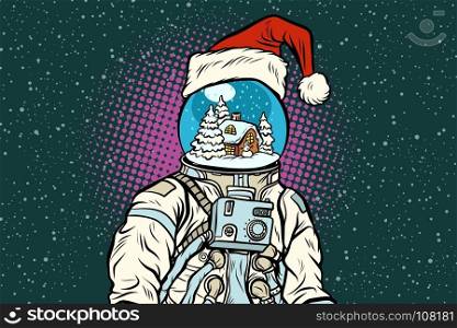 Christmas astronaut with dreams of gingerbread house. Pop art retro vector illustration.. Christmas astronaut with dreams of gingerbread house