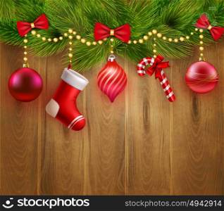 Christmas Festive Template. Christmas festive template with green fir twigs red balls candy sock bows on wooden background vector illustration