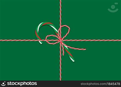Christmas gift decoration with green candy cane, red and yellow bow, ribbon on centre. Vector illustration. Stock image. EPS 10.. Christmas gift decoration with green candy cane, red and yellow bow, ribbon on centre. Vector illustration. Stock image.