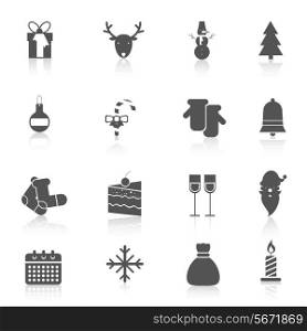 Christmas new year holiday season celebration black icons set isolated vector illustration.
