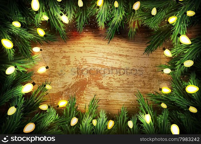 Christmas pine wreath with lights on wooden background. Copyspace for your text