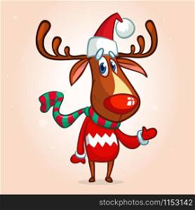 Christmas reindeer in Santa Claus hat and striped scarf pointing a hand. Vector illustration isolated