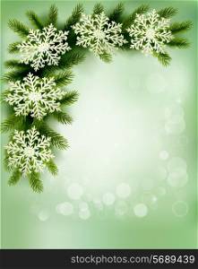 Christmas retro background with christmas tree branches and snowflakes.