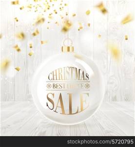 Christmas sale text on the ball with curves of ribbon confetti over wooden background. Vector illustration.