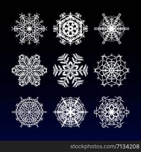 Christmas snowflakes set with complicated beautiful and filigree hand drawn snow stars for holiday ornaments, corporate greeting prints and xmas greeting cards
