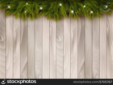 Christmas wooden background with branches and baubles. Vector.