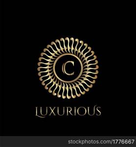 Circle luxury logo with letter C and symmetric swirl shape vector design logo gold color.
