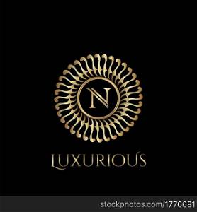 Circle luxury logo with letter N and symmetric swirl shape vector design logo gold color.
