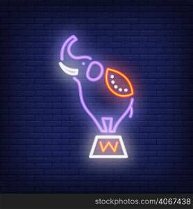 Circus elephant neon icon. Trained animal on stand on dark brick wall background. Night bright advertisement. Vector illustration in neon style for performance poster or toy shop