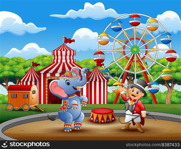 Circus ringmaster performs a trick along with elephant in arena 