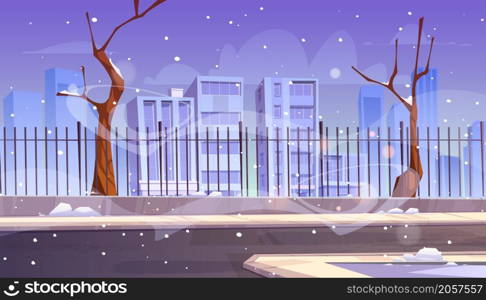 City street with snow, bare trees and buildings behind fence. Vector cartoon illustration of winter landscape with road, sidewalk, snowfall and houses on horizon. City street with snow and fence in winter