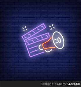 Clapper board and megaphone neon sign. Luminous signboard with film director belongings. Night bright advertisement. Vector illustration in neon style for producing, blogging, cinematography