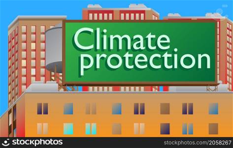 Climate protection text on a billboard sign atop a brick building. Outdoor advertising in the city. Large banner on roof top of a brick architecture.