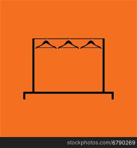 Clothing rail with hangers icon. Orange background with black. Vector illustration.