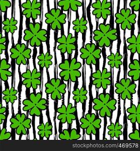 Clover seamless pattern on texture striped backdrop. Fashion background for textile design. Wrapping and packaging paper. Saint Patrick day design. Clover seamless pattern on texture striped backdrop. Fashion background for textile design. Wrapping and packaging paper. Saint Patricks day design