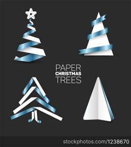 Collection of four christmas trees made from white and metalic blue paper or paper stripes on dark background