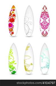 collection of six surfboards with abstract patterns and shadow