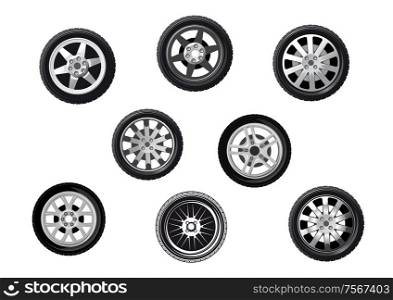 Collection of wheels or tyres with spoked alloy rims and hubs, isolated on white. Collection of alloy sporting motor car wheels