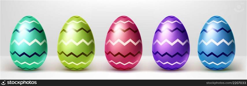 Colorful Easter eggs with zigzag lines pattern. Vector realistic set of spring holidays decoration, gifts for Easter hunt event. Collection of shiny red, green, blue and purple eggs with striped print. Colorful Easter eggs with zigzag lines pattern