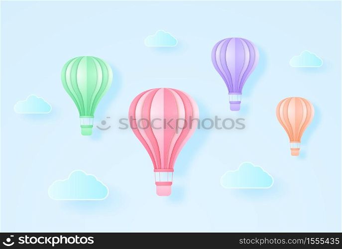 Colorful hot air balloons flying in the blue sky, paper art style