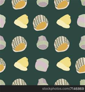 Colourful knitted beanies and hats seamless pattern on dark green background. Web, wrapping paper, textile, wallpaper design, background fill.. Colourful knitted beanies and hats seamless pattern on dark green background